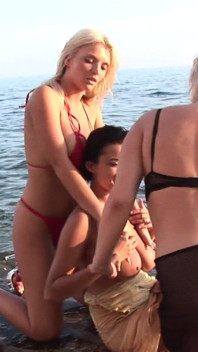 Three busty babe in action on the beach