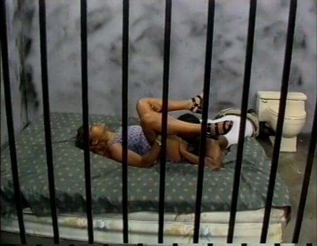 Hot and Wet: Black on black action behind prison bars