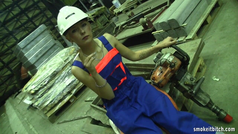 Smoke it bitch: Skinny blonde worker in the factory takes her break for...