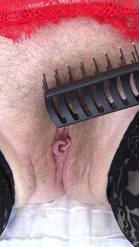 Mature Hairy Pussy Cums From a Comb Close-up. Amateur Fetish with a Plump Pubic Mound and Bush.