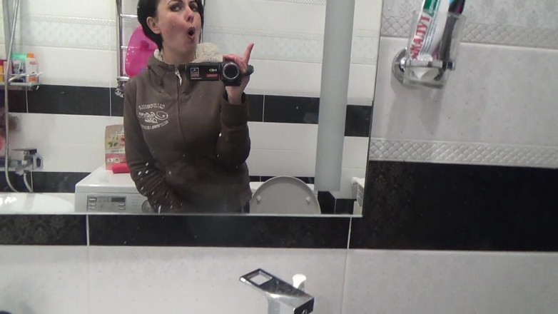 Sexy Milf: Pissing on the toilet long and a lot after long...
