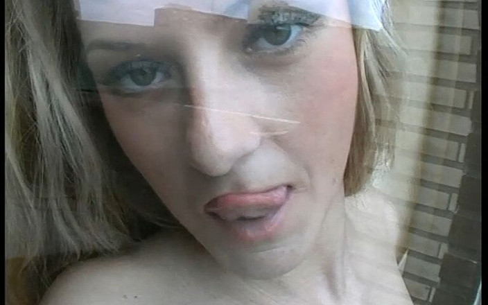 Magmafilm: She Shows Her Gorgeous Tits Through the Window Until He...