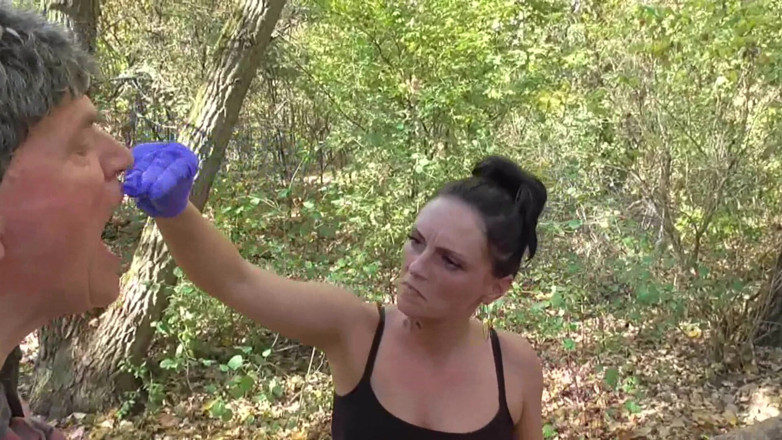 Femdom Austria: Humiliating him with their spits and slime in the forest