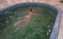 Sweet Buttocks: Girl Jumps Naked Into the Pool