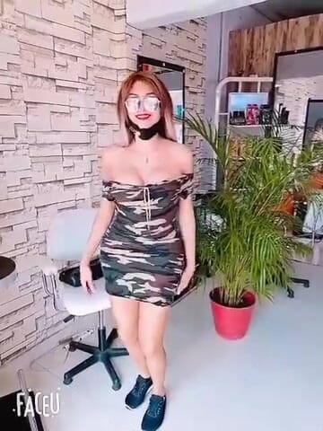 Barbietransxxxx: Tranny in a square showing off her tits in front...