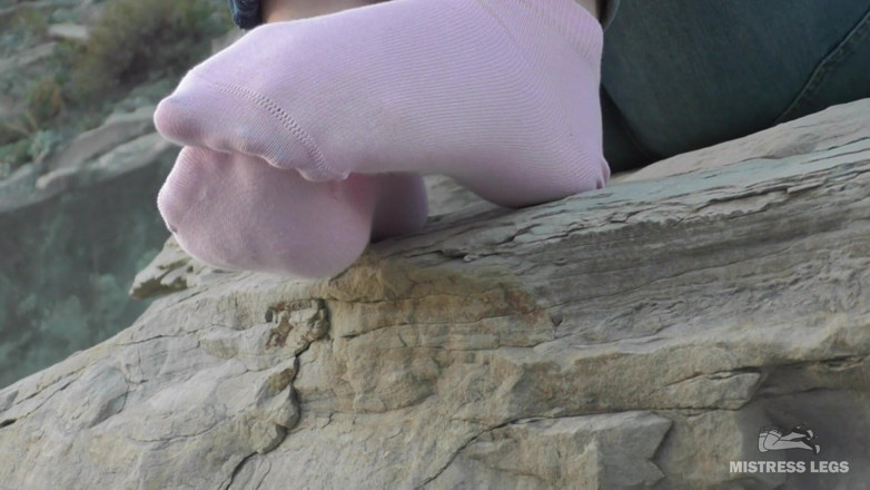 Mistress Legs: Sexy feet in pink ankle socks on the seashore