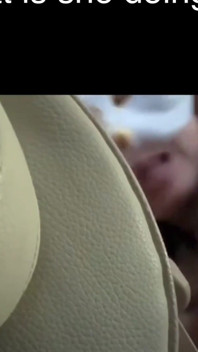 What Is She Doing in the Car?