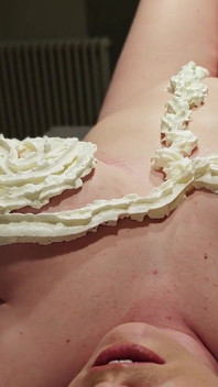 A Naked Woman with Huge Tits in a Massage Parlor Using Whipped Cream.
