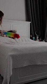 Stepmom Tidies the Bedroom. in Her Sheer White Robe