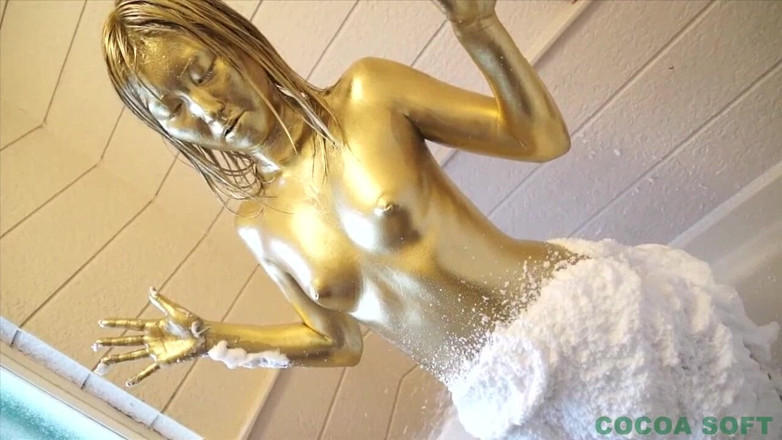 Cocoa Soft: Start painting gold paint on the whole body using a...