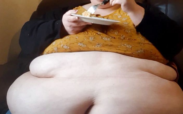 SSBBW Lady Brads: SSBBW eating cake with belly out