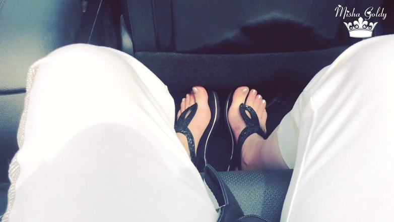 Goddess Misha Goldy: Feet tease in mustang cabriolet