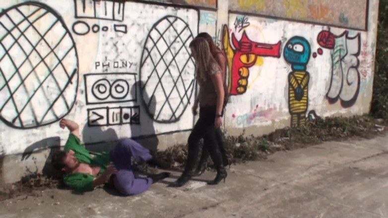 Femdom Austria: Kicking a Horny Guy in the Street