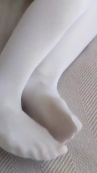 Footjob dengan stoking putih