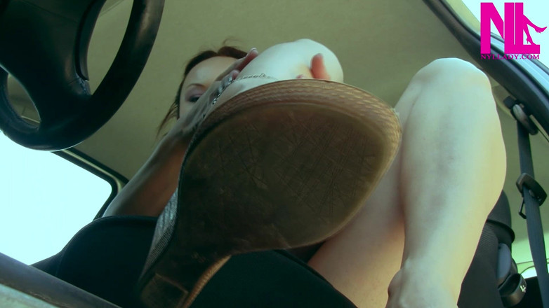 Nyllady: Dangling and Changing Flip Flops in the Car