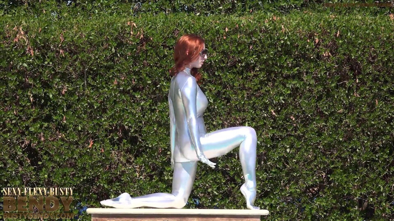 Flexilady: Bending in a Silver Spandex Suit