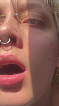 No Makeup Goth Girl in the Sun Flares Piggy Nose