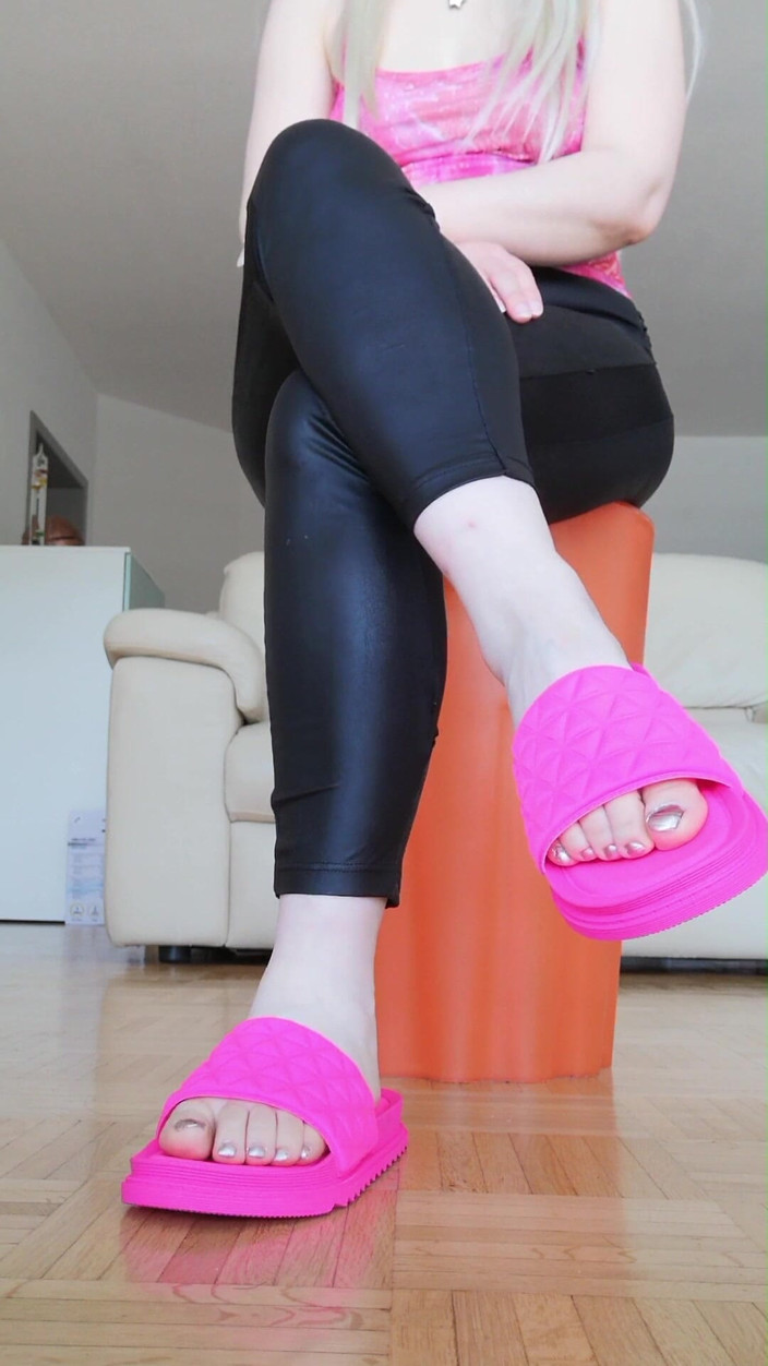 RavenBigAss: Raven: Toe-tapping with Crossed Legs Latex Trousers and Fuchsia Slides