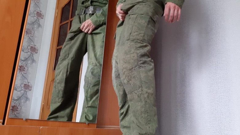AlexRusFun: A Russian soldier in military uniform and dirty socks jerks...