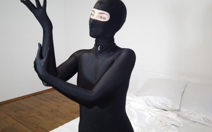 Mary Rock: Mary Rock posing in a black ninja costume