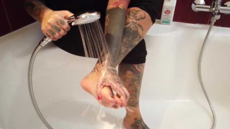 Fetish videos by Alex: Tattooed Blonde MILF Washes Her Feet