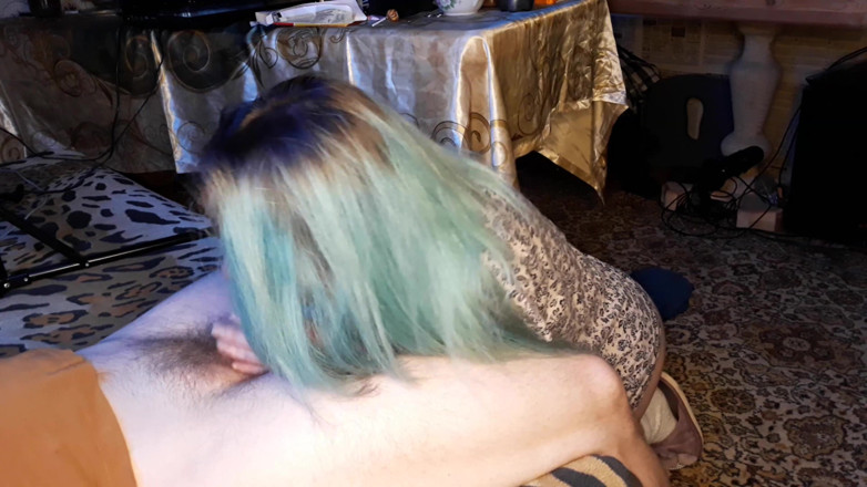 Blowjobs Alice: Asian woman with blue hair touches an uncut dick with...