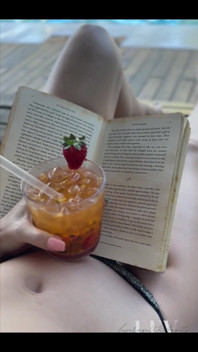 Reading by the Pool in a Bikini That Barely Counts as Spf