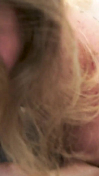 Blonde MILF stretching her pussy