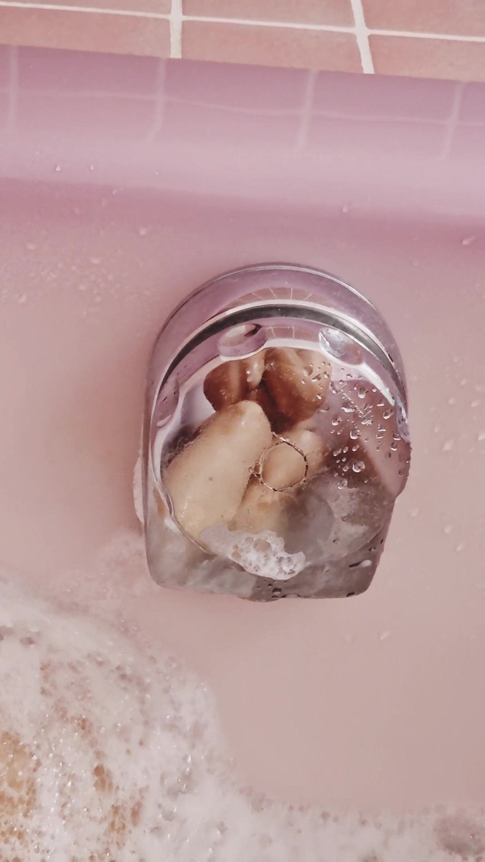 Daphnee Lecerf: Rubbing my feet on a bath flower