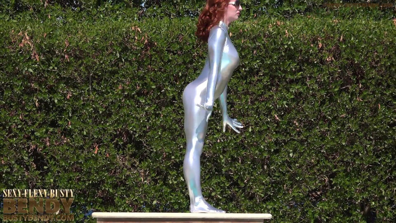 Flexilady: Bending in a Silver Spandex Suit