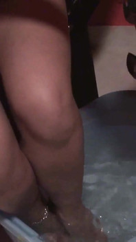 Slave drinking dirty water from cleaning her feet