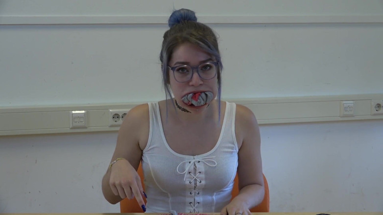 Restricting Ropes: Gagging herself with socks up close
