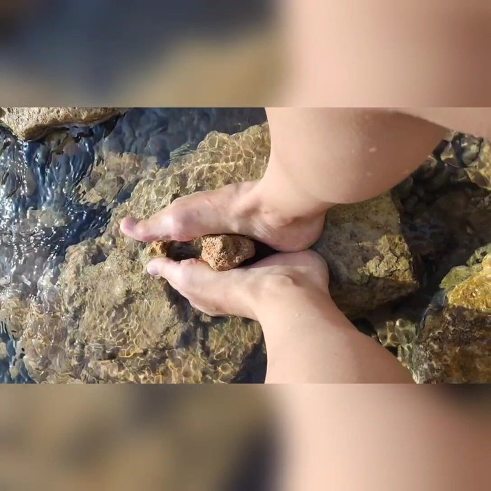 Hairy couple: Footjob in the Sea