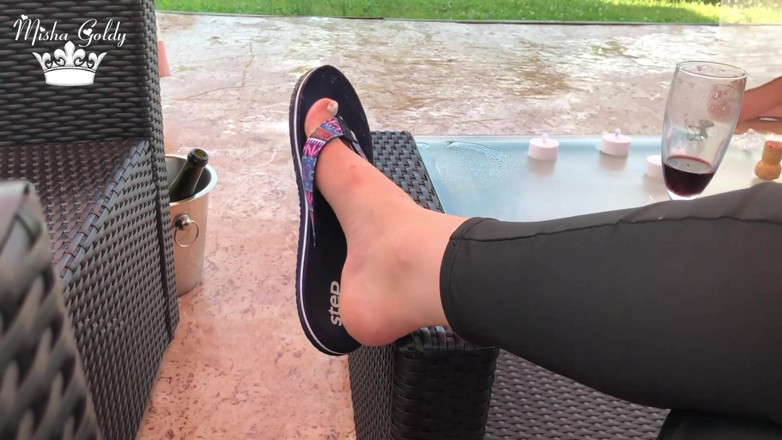 Goddess Misha Goldy: Flip flops dangling outdoor near lake with silver nails &amp; toes...