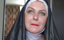 Goddess Misha Goldy: Sexy nun putting a lot of red lipstick and teasing...