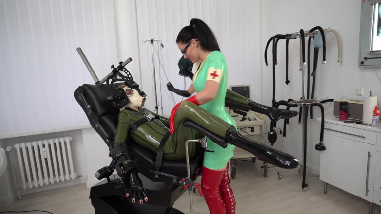 Rubber pervs: 2 Latex Femdoms Give the Slut a Medical Exam