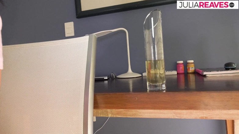 Pissing Sluts: Hot brunette pisses on a glass after stroking clit hard