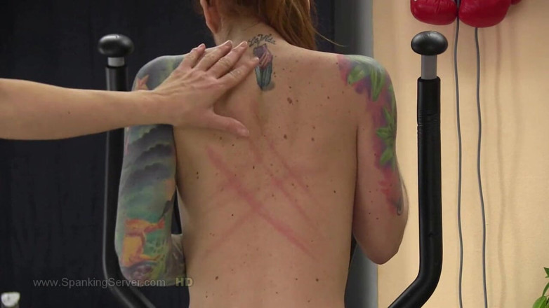 Spanking Server: Foxy tattooed bare back whip