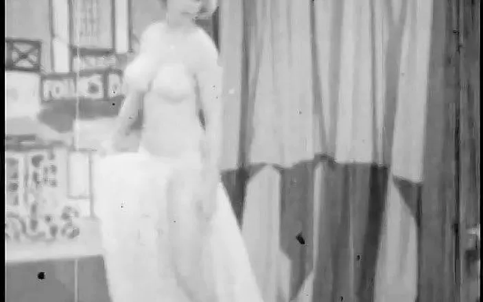 Vintage Usa: Strip-tease of a blonde woman in the sixties