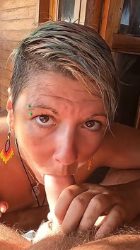 A Nice Blowjob on the Terrace Overlooking the Beach