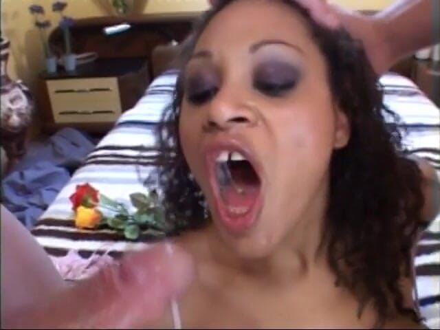 Hot and Wet: Black milf is on her knees sucking two cocks and...