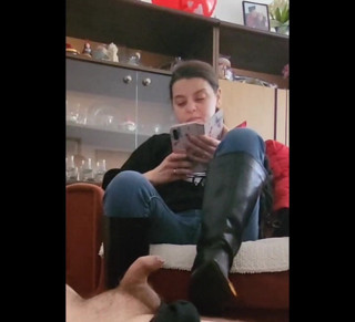 Mistressyammyboots: Smoking while doing a footjob