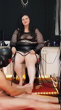 Dominant Brunette Mistress Torments Her Submissive Slave