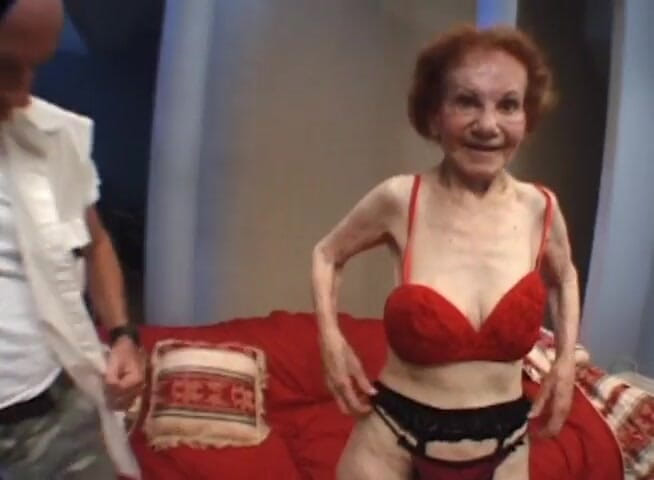 Gilfy Pleasure: Redhead granny banged by two guys