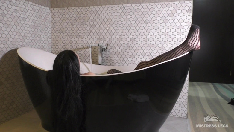 Mistress Legs: Mistress legs in black fishnets in bath tease and ignore