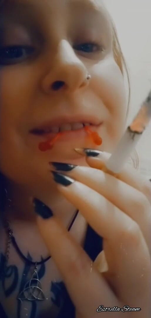 Estrella Steam: Smoking girl close up