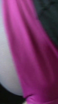 Pink nylon mask and grey pantyhose legs
