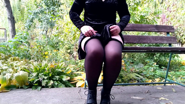Elena: Peeing with legs spread wide on a bench in an...