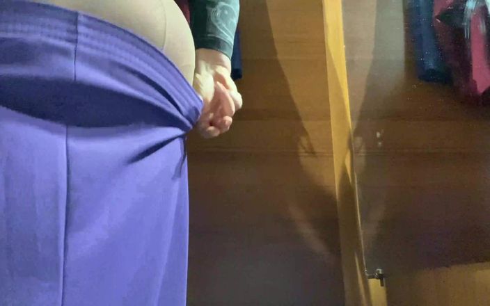 SoloRussianMom: Curvy MILF in the mall fitting room trying on skirts.