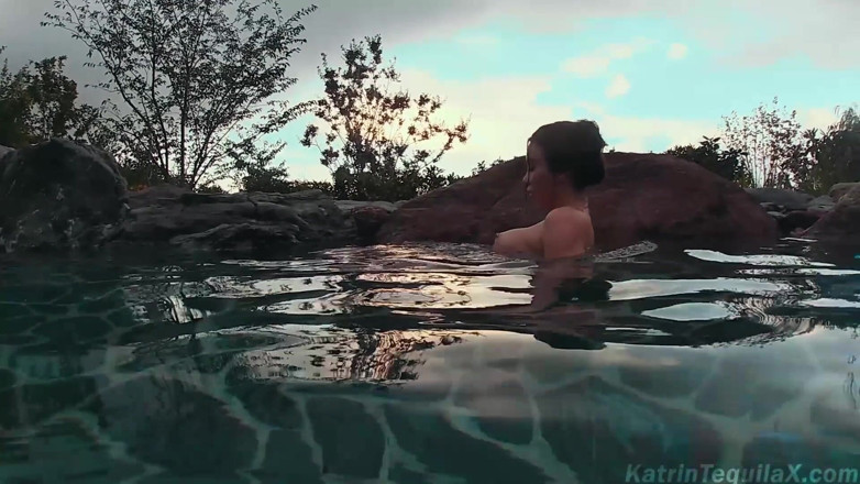 Katrin Tequila: Horny teen wet fingering pussy outside in the swimming pool